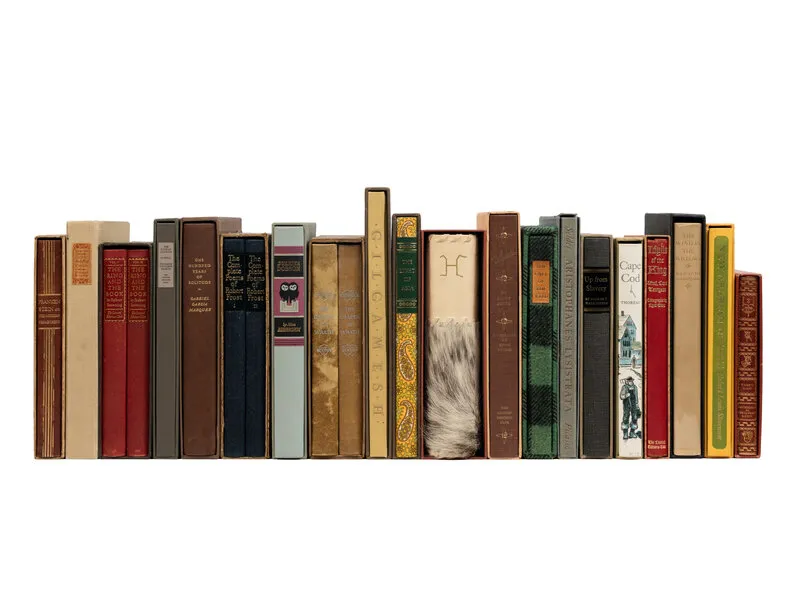 A collection of rare Limited Editions Club books from the early 1900s, featuring fine press designs, illustrated covers, and collectible slipcases.